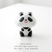 Solar panda desk companion front view on white background showing cute face and seated pose