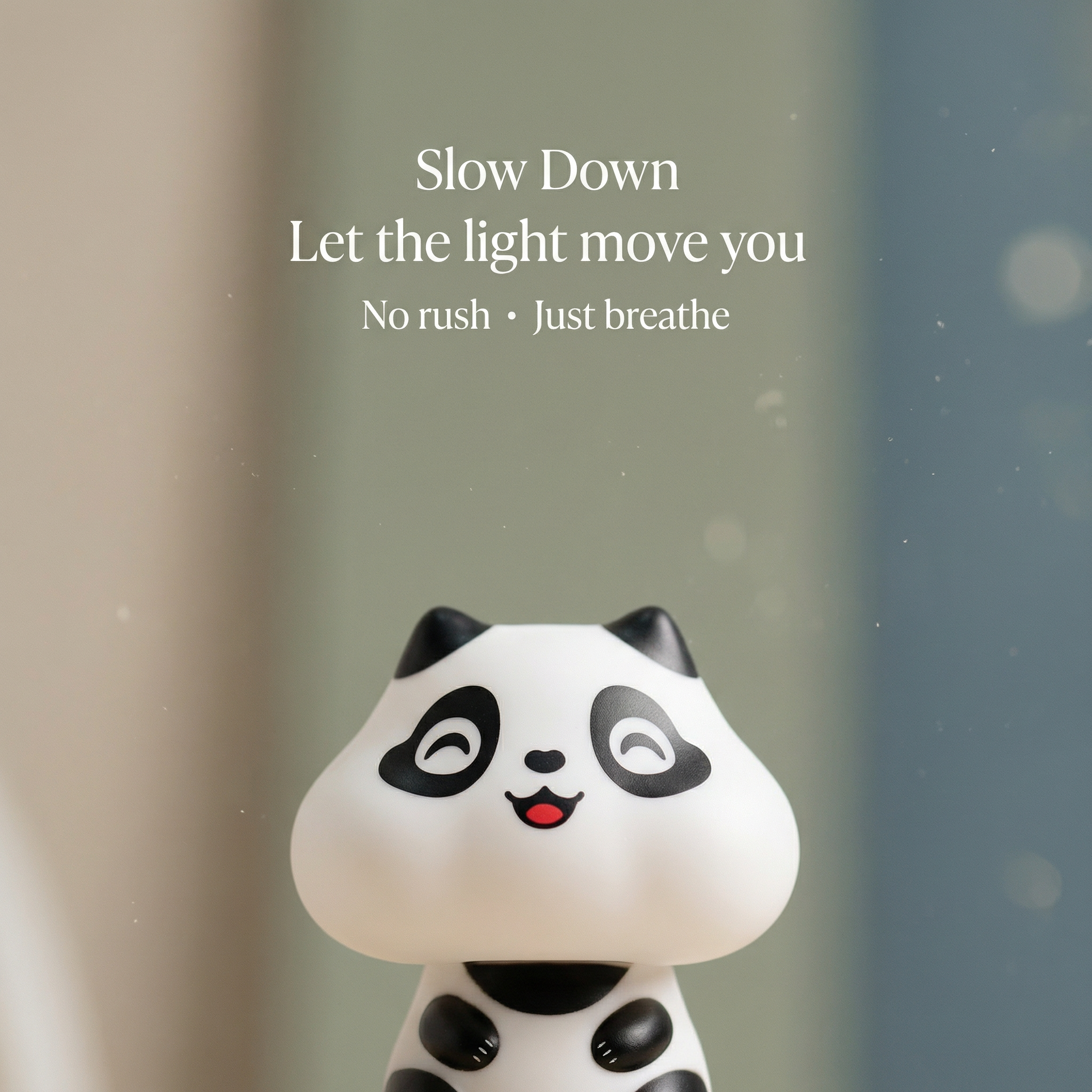 Close-up portrait of solar panda figurine face with dreamy bokeh background